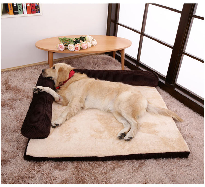 Golden retriever relaxing on a corduroy pet dog bed in a cozy room.